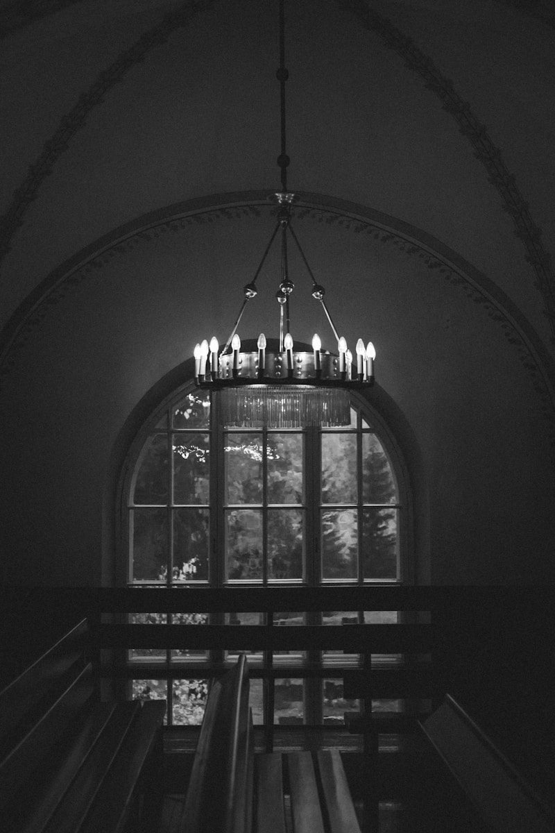grayscale photo of ceiling lamp